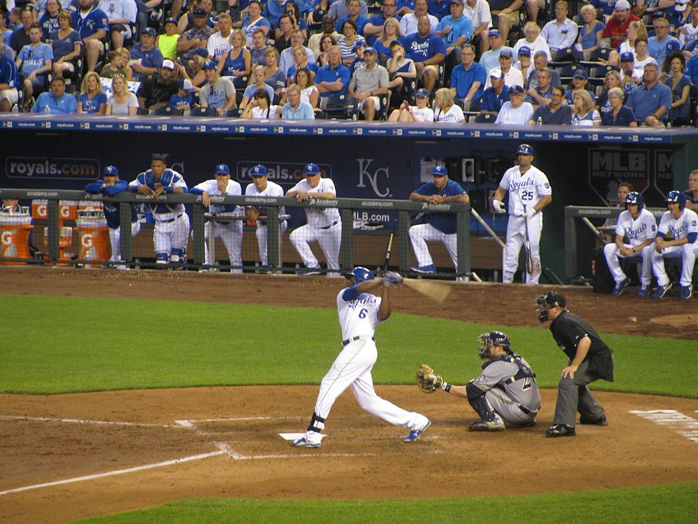 Lorenzo "LoCain" Cain taking a swing at a Brewer fast ball. (There all fast to me, curvy or not.)